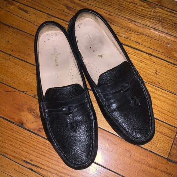 Men Cole Haan black penny loafers to perfect your office look